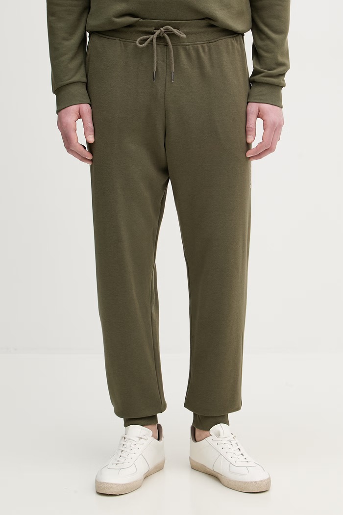 Tommy Hilfiger teplákové nohavice pánske s bavlnou zelená UM0UM03664