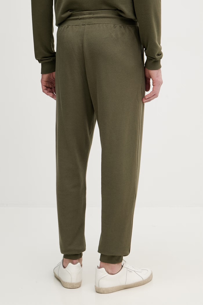 Oblečenie Tommy Hilfiger teplákové nohavice pánske s bavlnou UM0UM03664 zelená