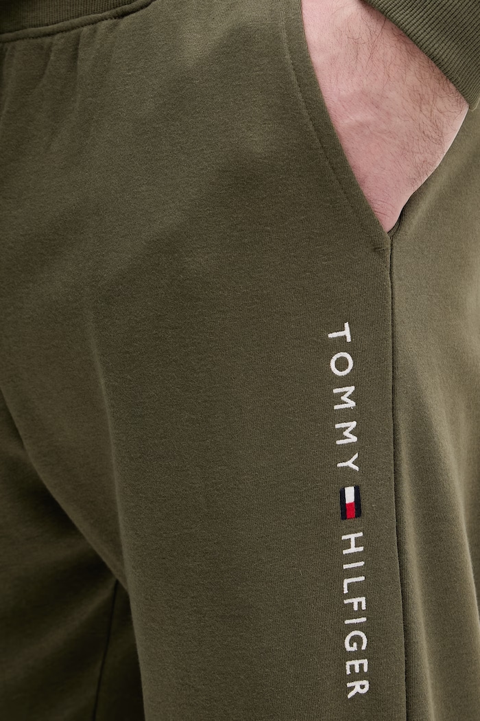 Tommy Hilfiger teplákové nohavice pánske s bavlnou zelená UM0UM03664