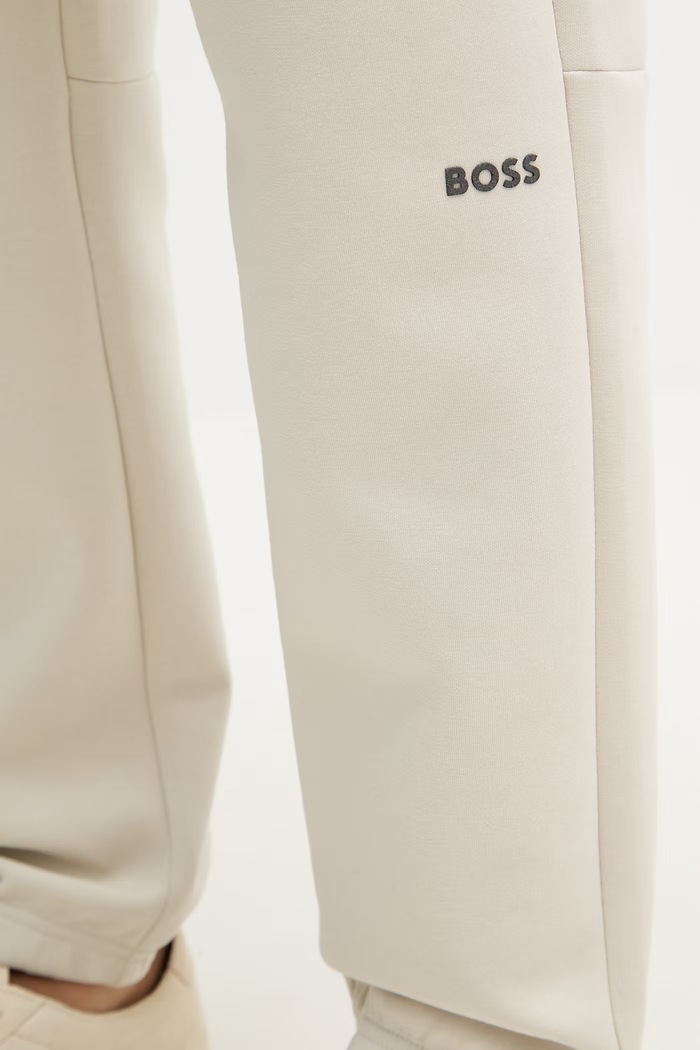 BOSS Green teplákové nohavice pánske béžová 50558960