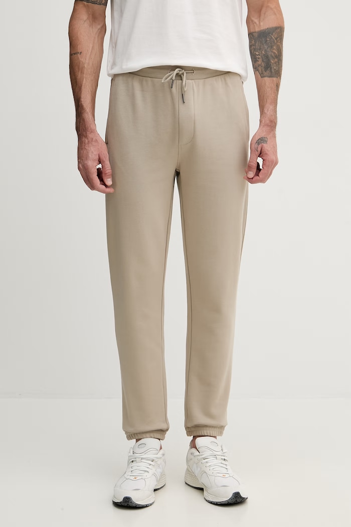 Armani Exchange spodnie dresowe męskie bawełniane beżowy XM002447.AF22124