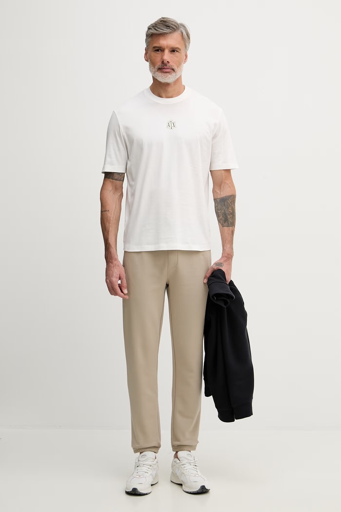 Armani Exchange spodnie dresowe męskie bawełniane XM002447.AF22124 beżowy SS26