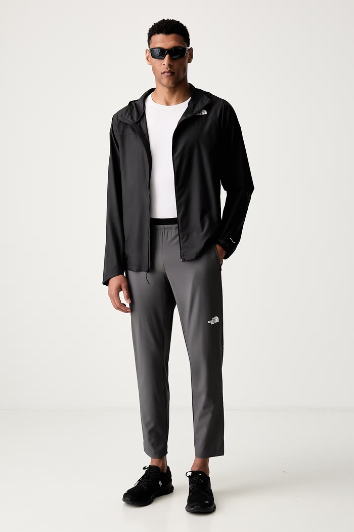 The North Face spodnie treningowe męskie NF0A8FJHRHI1 szary SS26
