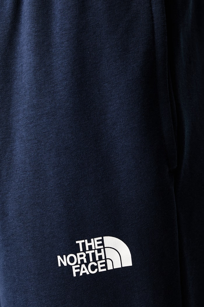 The North Face spodnie dresowe męskie z bawełną Simple Dome granatowy NF0A8C418K21