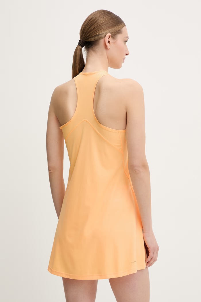 Odzież adidas Performance sukienka sportowa KF0974 pomarańczowy