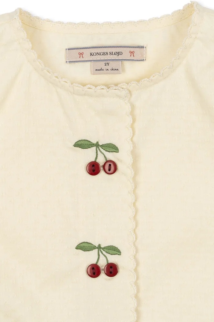 Dievča Dievčenské bavlnené šaty Konges Sløjd EVIA CHERRY DRESS GOTS KS104794.PPY2 béžová