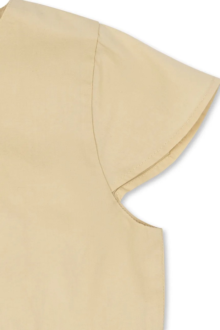 Konges Sløjd šaty bavlnené HEARLY DRESS GOTS KS105411.PPY2 béžová