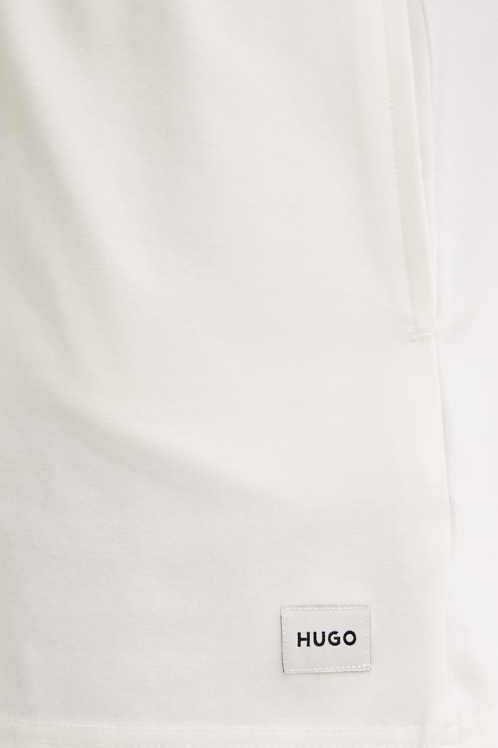HUGO pantaloncini da donna con cotone SIGNATURE_SHORT beige 50556815