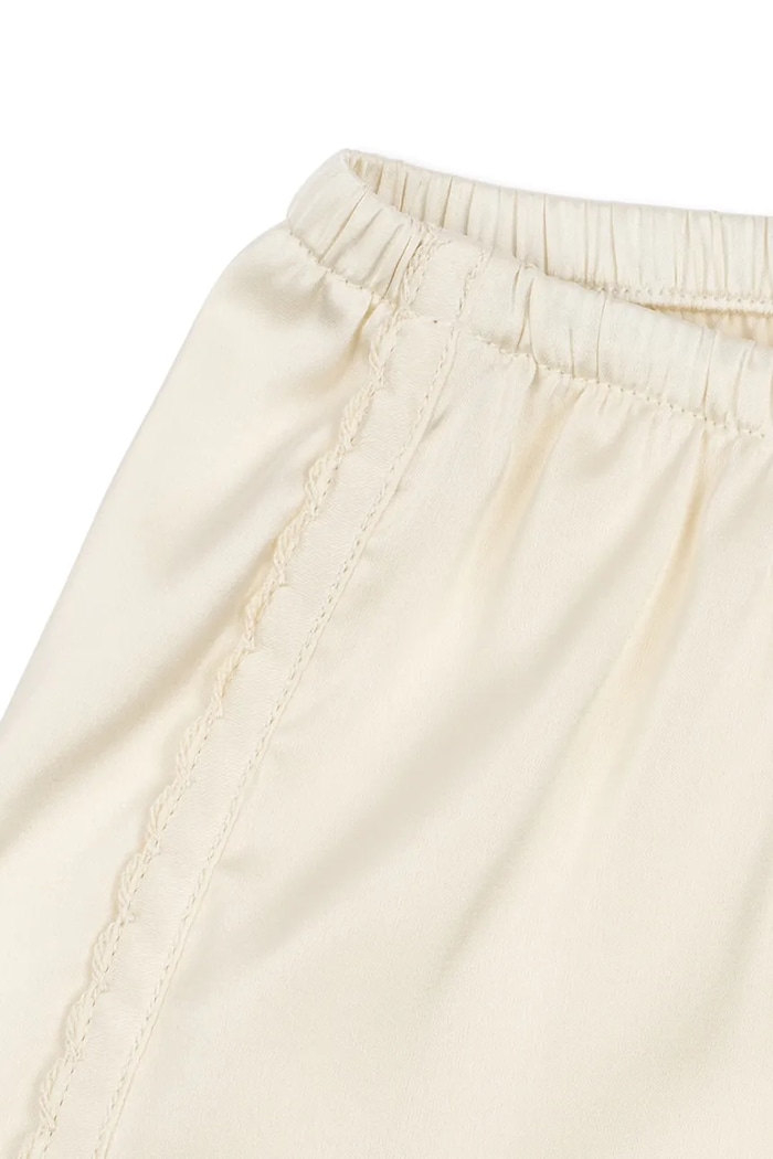 Konges Sløjd szorty dziecięce SHEENY SHORTS beżowy KS105536.PPY2