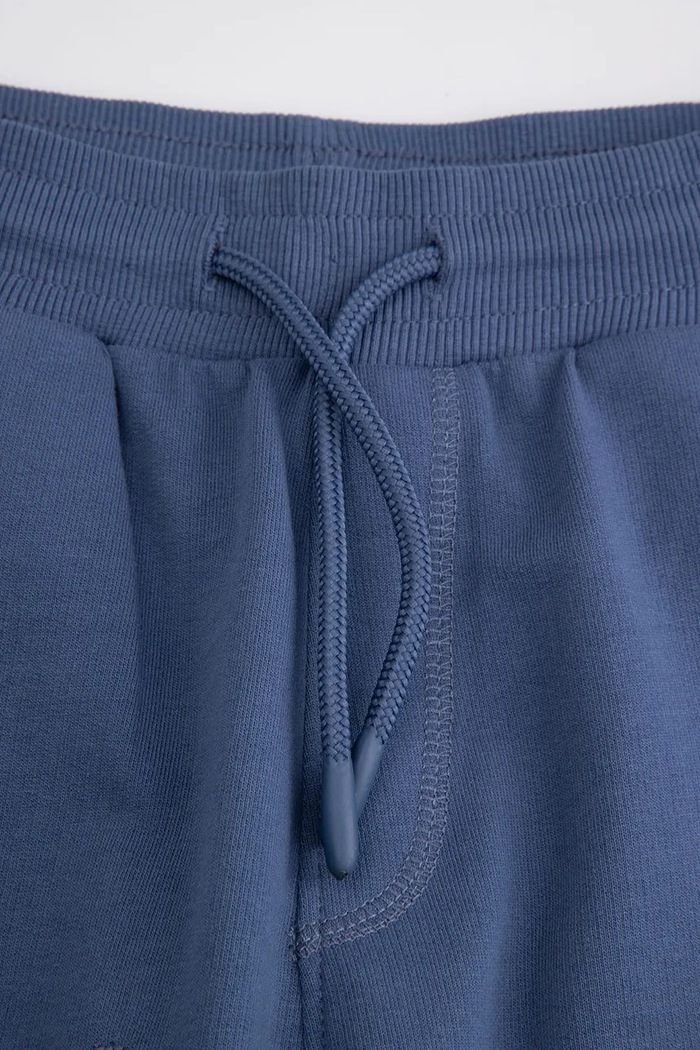 Chlapec Coccodrillo teplákové šortky detské s bavlnou WC6120501VBB modrá