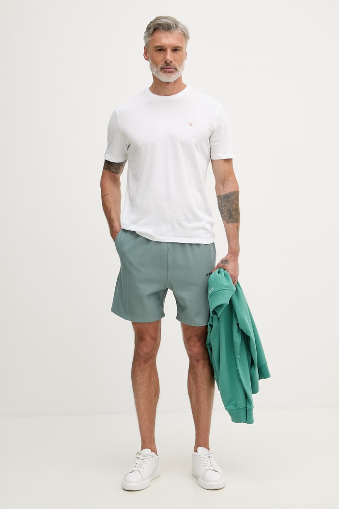 Calvin Klein Jeans teplákové šortky pánske LV04RF252G zelená SS26