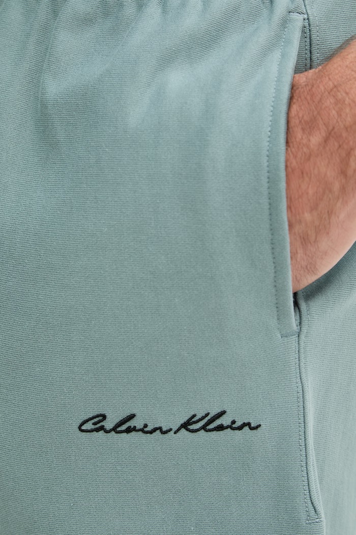 Calvin Klein Jeans teplákové šortky pánske zelená LV04RF252G