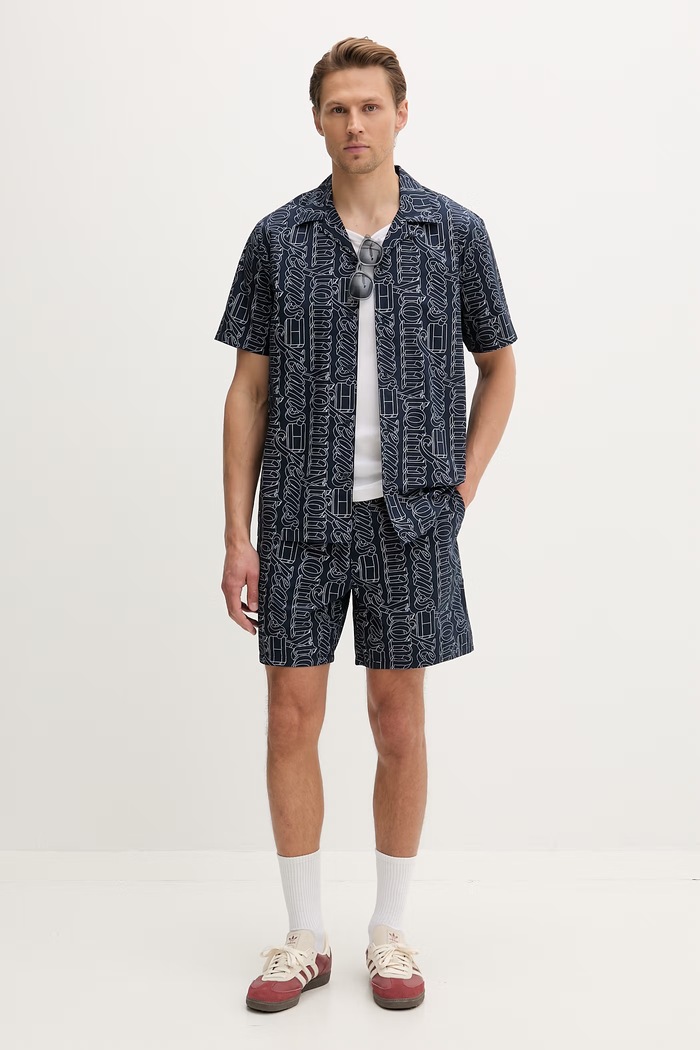 Tommy Jeans šortky pánske bavlnené DM0DM22829 tmavomodrá SS26