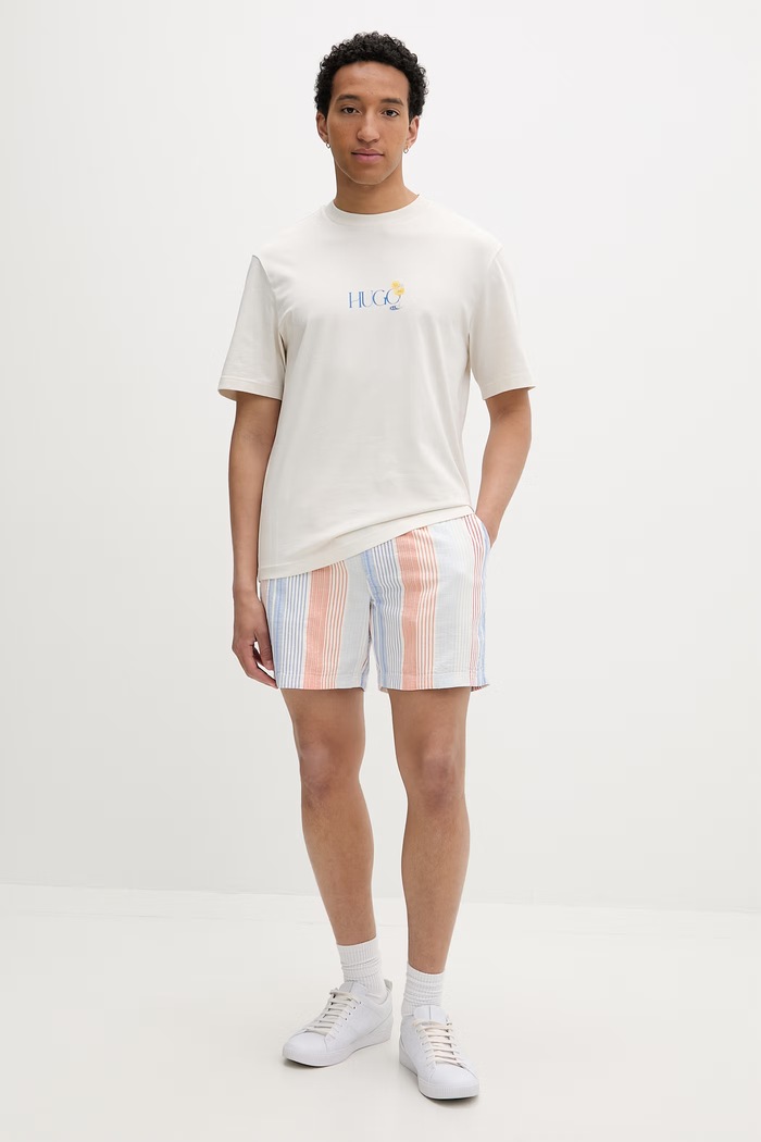 Tommy Jeans šortky pánske bavlnené DM0DM22830 oranžová SS26