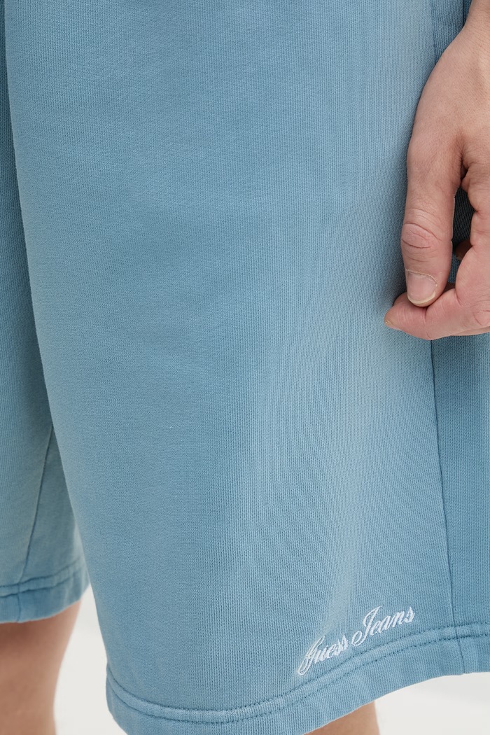 Guess Jeans teplákové šortky pánske bavlnené modrá M6GD49.KCPR1