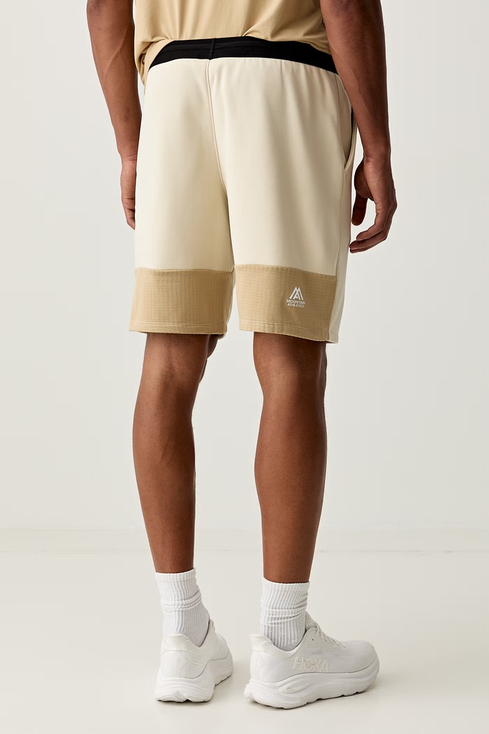Odzież The North Face szorty sportowe męskie FLEECE SHORTS NF0A893TDOM1 beżowy