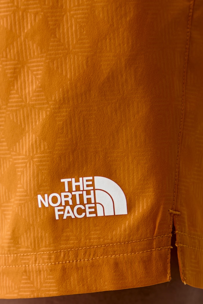 The North Face szorty sportowe męskie 24/7 pomarańczowy NF0A8G89G5I1