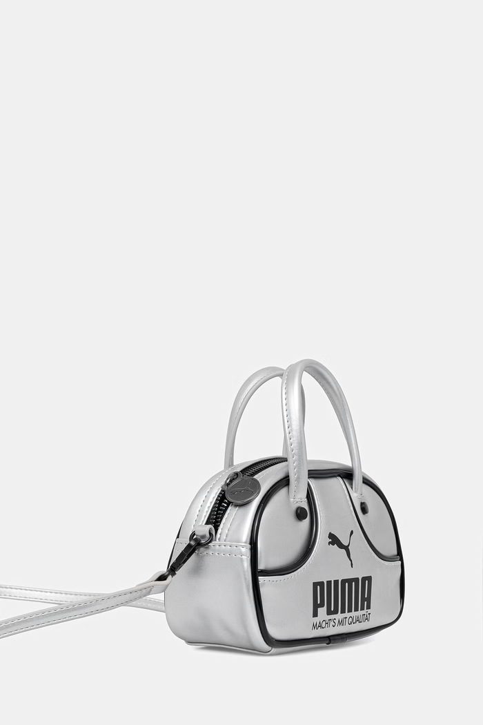 Torbica Puma 1976 Metallic Micro Grip 092485 srebrna SS26