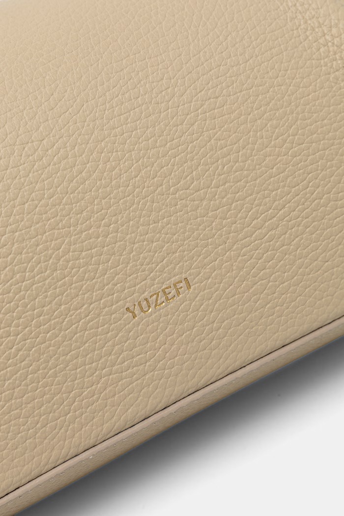 Yuzefi μικρή γυναικεία δερμάτινη τσάντα OYSTER CLUTCH MINI μπεζ YUZRS26.HB.MOYC.L066
