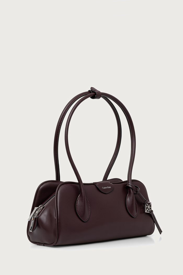 Calvin Klein Baguette torbica za žene od imitacije kože LV04F3369G bordo SS26