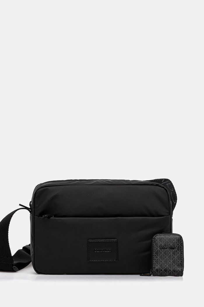 Calvin Klein saszetka nie mieści A4 czarny LV04D3199G