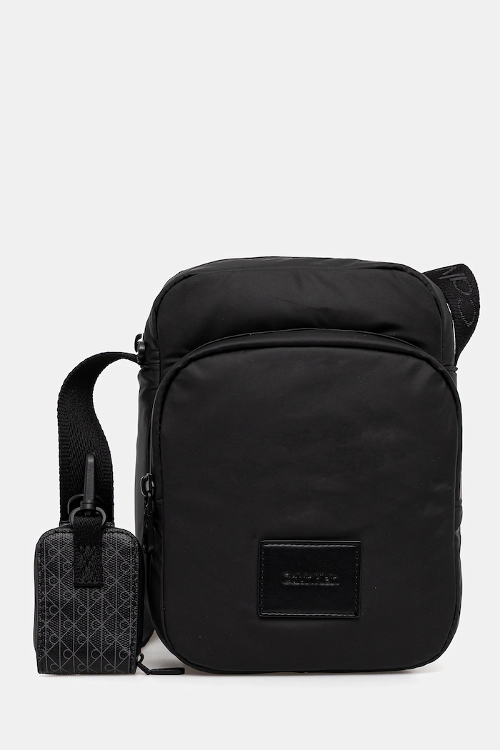 Calvin Klein saszetka nie mieści A4 czarny LV04D3200G
