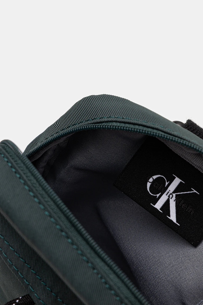 Taštička Calvin Klein LV04D3231G zelená