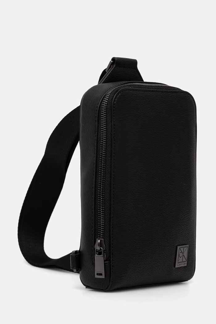 Calvin Klein taštička na krk pánská z imitace kůže LV04D3292G černá SS26
