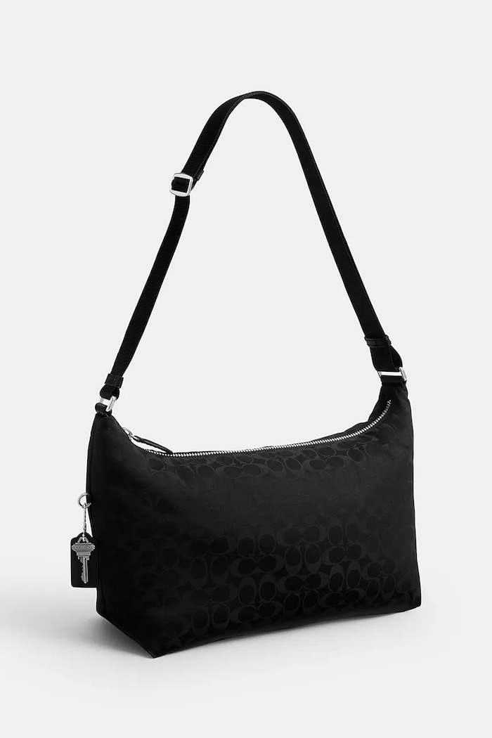 Dodatki Coach tekstilna moška torba Leo Crossbody CDV02 črna