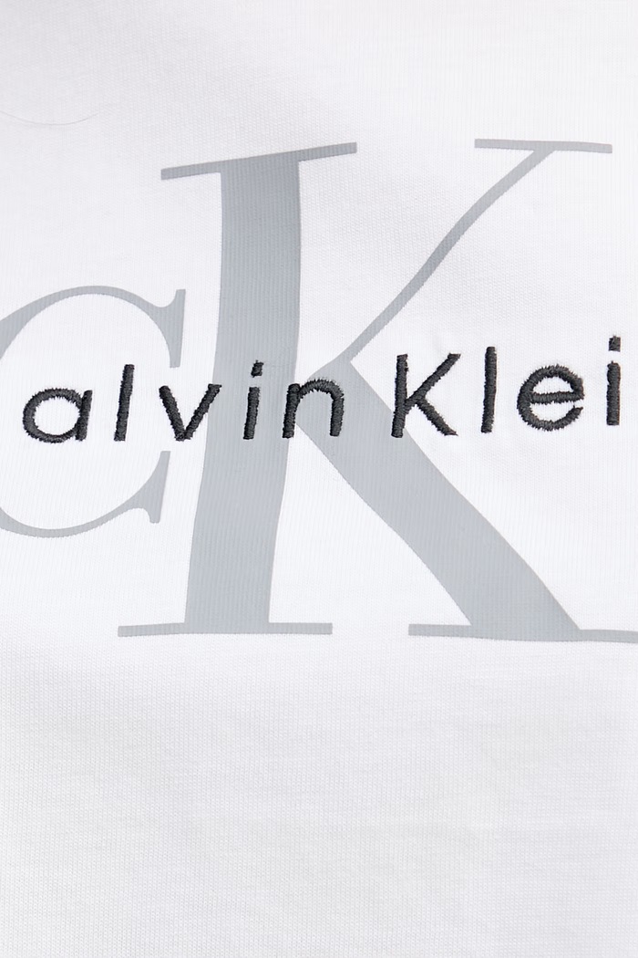 Calvin Klein Jeans crop top dámsky bavlnený LV047F828G biela