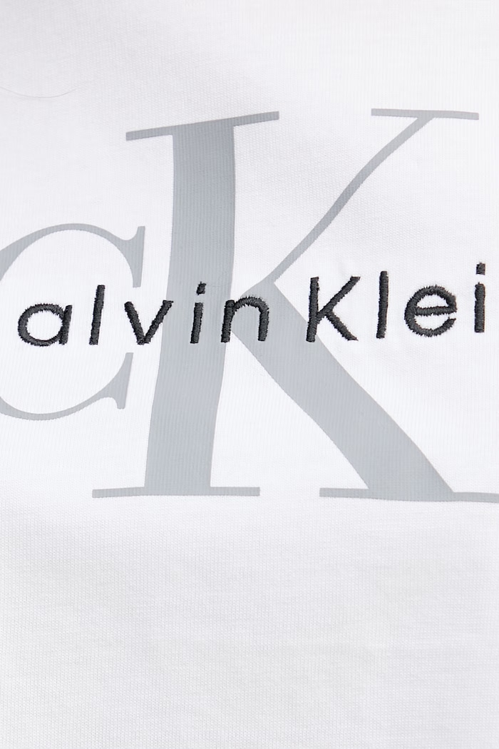 Calvin Klein Jeans crop top dámsky bavlnený LV047F828G biela