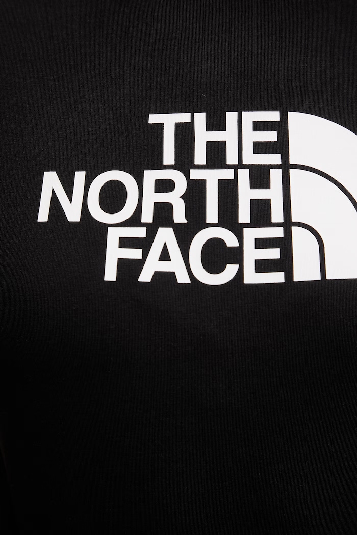 The North Face női póló pamuttal EVOLUTION NF0A8FX6JK31 fekete