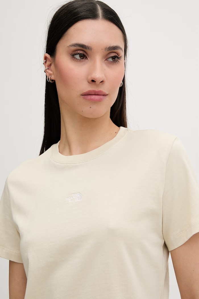 The North Face crop top ženski bombažen ESSENTIAL bež NF0A8GR1DOM1