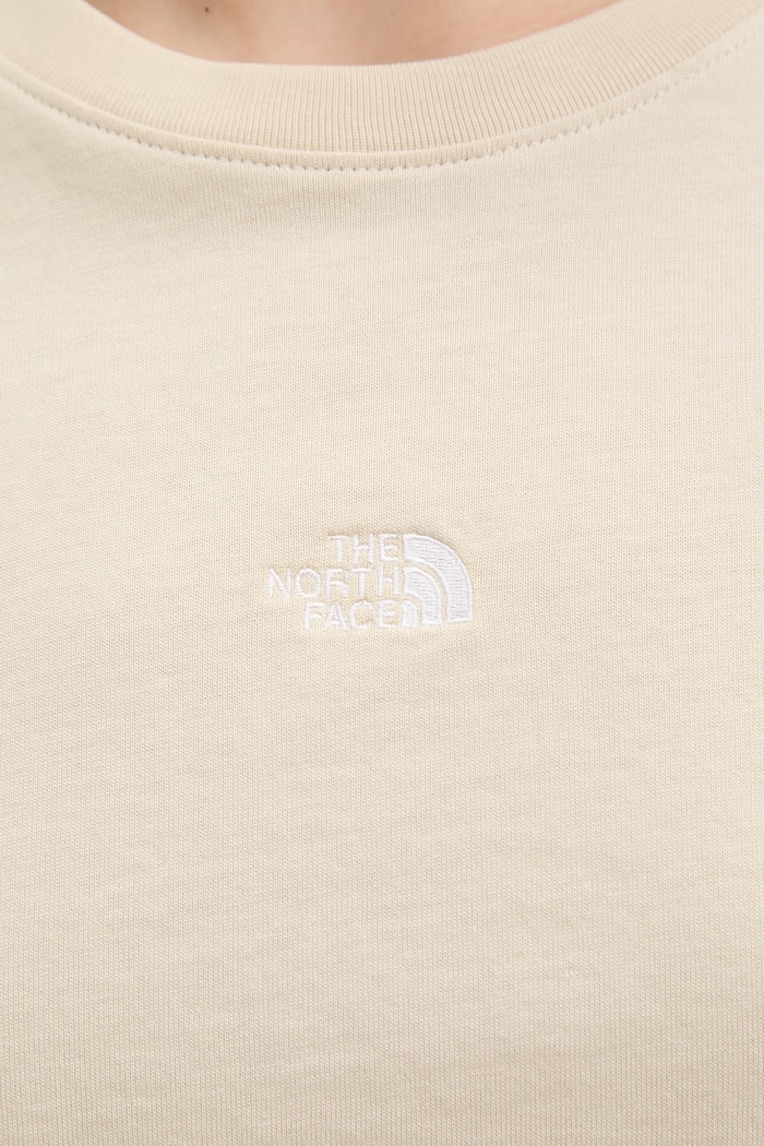 The North Face crop top ženski bombažen ESSENTIAL NF0A8GR1DOM1 bež