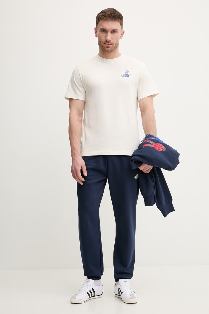 The North Face t-shirt bawełniany MOUNTAIN CELEBRATION NF0A8G9ZQLI1 beżowy SS26