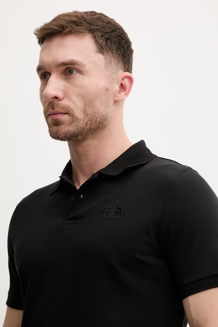 Памучна тениска с яка The North Face REGULAR POLO черен NF0A8C1PJK31