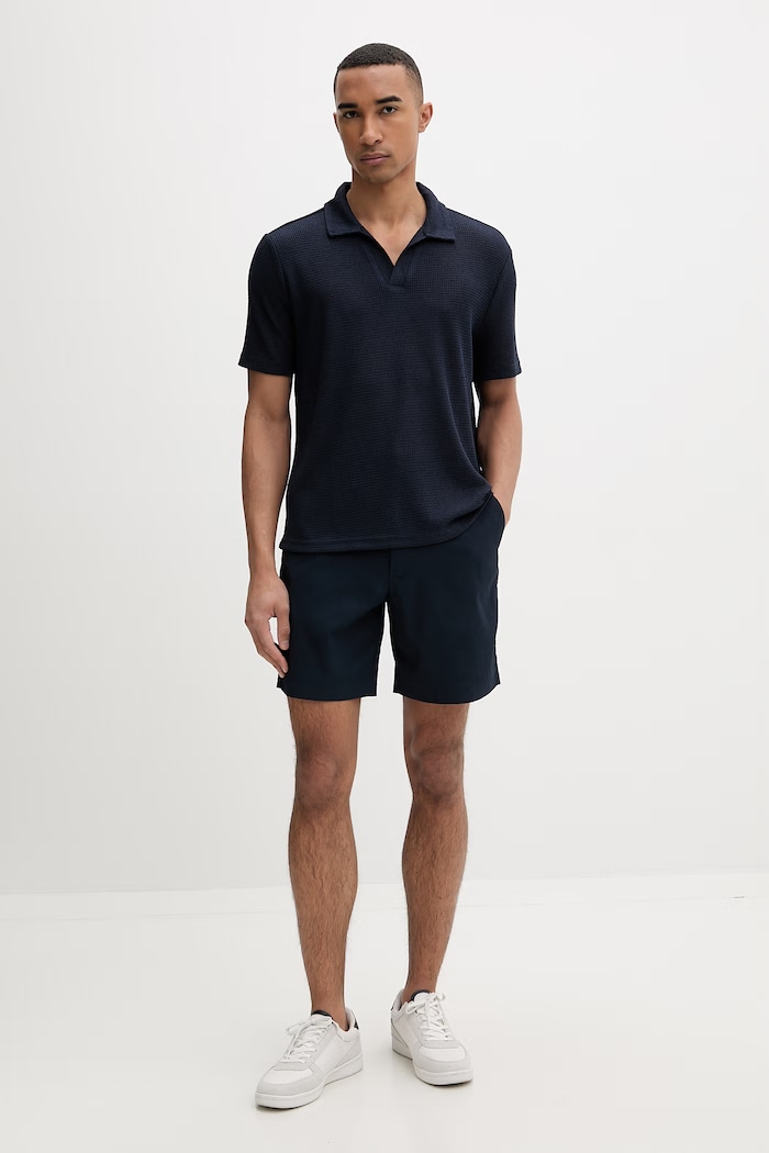 Calvin Klein úpletové polo tričko pánske s viskózou LV00NM2986 tmavomodrá SS26