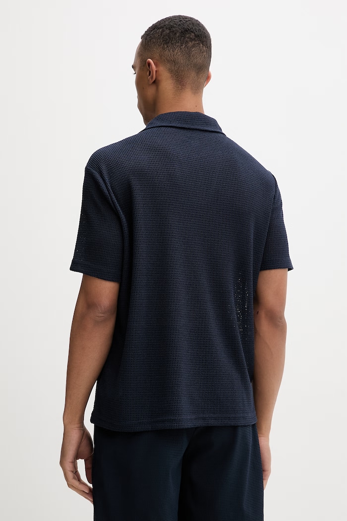 Oblečenie Calvin Klein úpletové polo tričko pánske s viskózou LV00NM2986 tmavomodrá