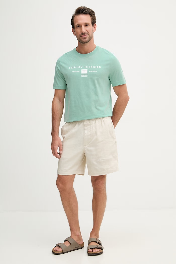 Tommy Hilfiger tričko pánske bavlnené MW0MW42365 tyrkysová SS26