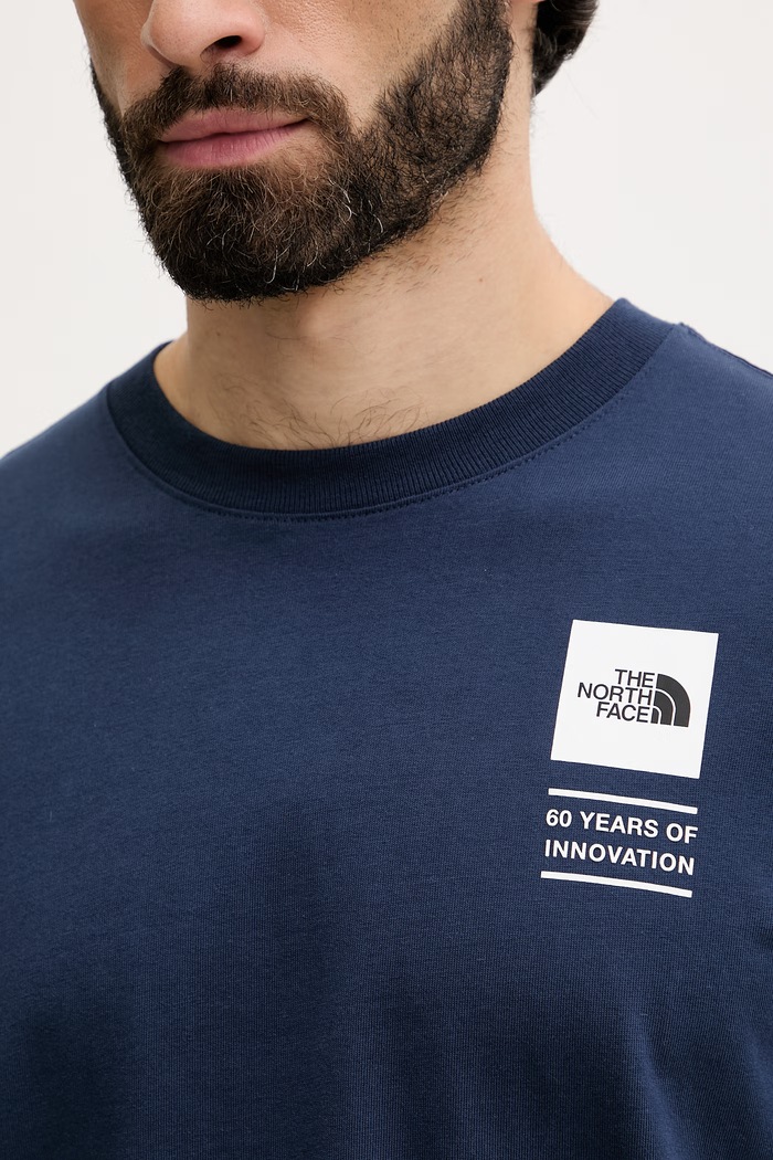 The North Face pánske bavlnené tričko CELEBRATION NF0A8GAR8K21 tmavomodrá
