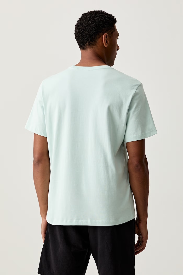 Odzież The North Face T-shirt basic męski bawełniany Essential Center Logo NF0A8GQEG701 turkusowy