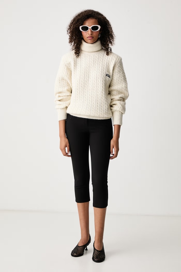 Rotate Sweter damski z wełną 116907857 beżowy SS27
