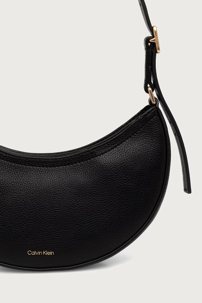Akcesoria Calvin Klein Torebka hobo damska z imitacji skóry LV04F3853G czarny