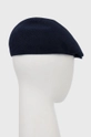 Kapa Kangol  Temeljni materijal: 65% Viskoza od bambusa, 35% Modakril Drugi materijali: 100% Najlon