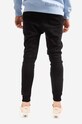 Odzież Alpha Industries spodnie dresowe Basic Jogger AI Foil Print 116368FP.530 czarny