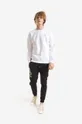 Alpha Industries spodnie dresowe Basic Jogger AI Foil Print czarny