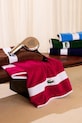 Μικρή βαμβακερή πετσέτα Lacoste LCASUAL Bigarreau 55 x 100 cm μωβ 1063379