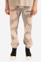 PLEASURES joggers all-over print beige P22SP030