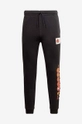 Reebok Classic pantaloni de trening Looney Tunes  70% Bumbac, 30% Poliester reciclat