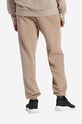 Odzież Reebok Classic spodnie dresowe bawełniane Natural Dye FT HT8197 beżowy